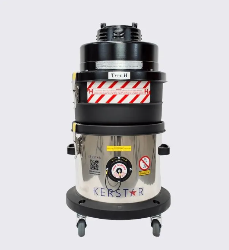Kerstar industrial vacuum cleaner, stainless steel body, black top, wheels.