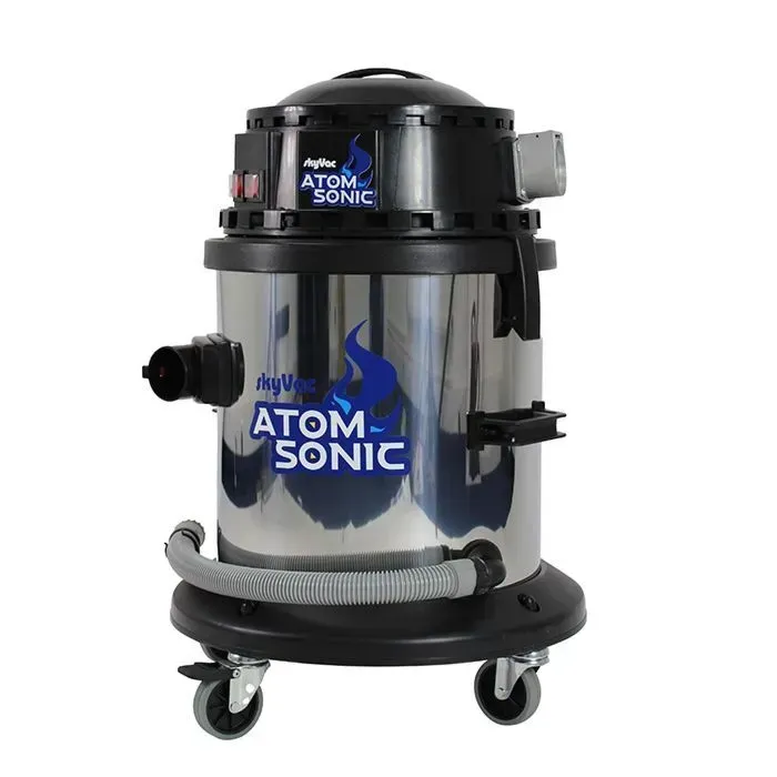Stainless steel Atom Sonic wet/dry vacuum cleaner with blue flame logo, black top, and wheels.
