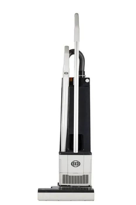 Upright vacuum cleaner, white and black, standing upright.
