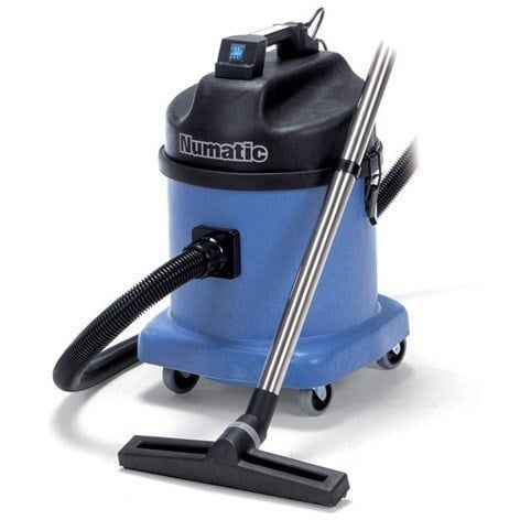Blue Numatic vacuum cleaner with metal wand and black hose.