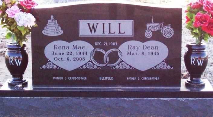 Maroon double headstone with white vases and flowers, memorializing Will and Rena Mae and Ray Dean Willie