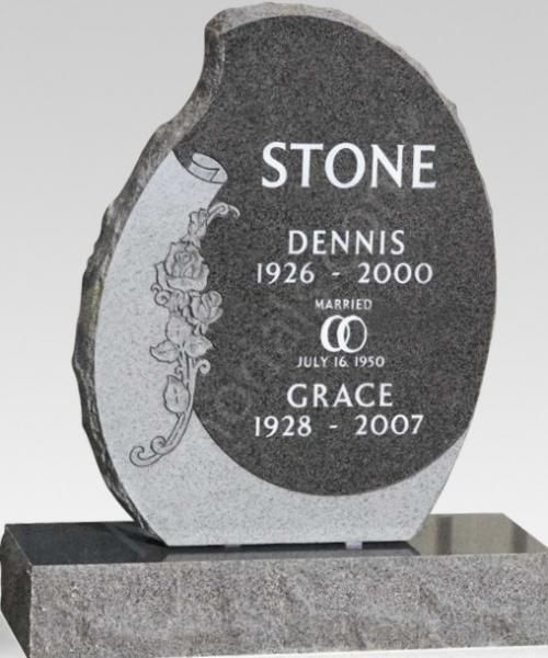 Gray granite memorial stone with engraved names, dates, and floral design