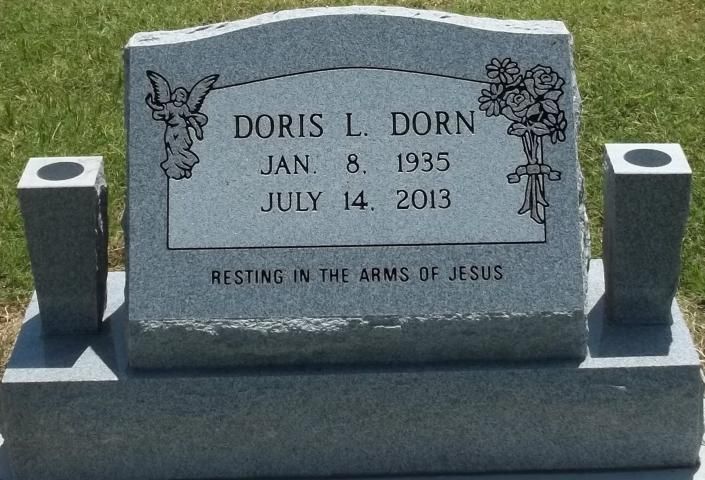 Gray gravestone with angel carvings for Doris L. Dorn, dated Jan. 8, 1935 and July 14, 2013