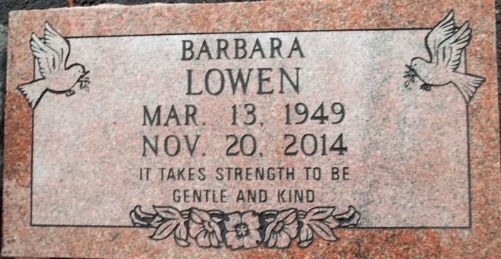 Gravestone for Barbara Lowen with dates Mar. 13, 1949 and Nov. 20, 2014, with dove carvings.
