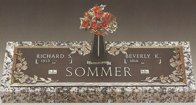 Sommer family grave marker with flowers and engraved names Richard and Beverly L.