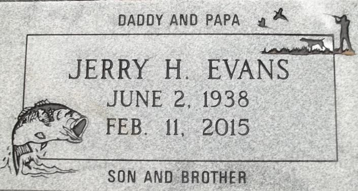 Gravestone for Jerry H. Evans with dates June 2, 1938 and Feb. 11, 2015, labeled “Daddy and Papa.”