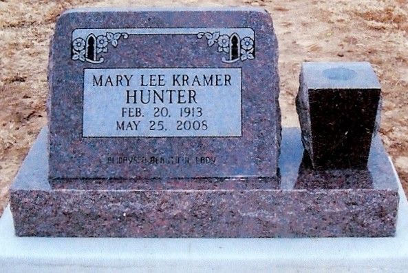 Gravestone for Mary Lee Kramer Hunter with engraved dates and a small vase on the right