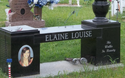 Black granite cemetery monument with oval portrait and the name Elaine Louise engraved on it.