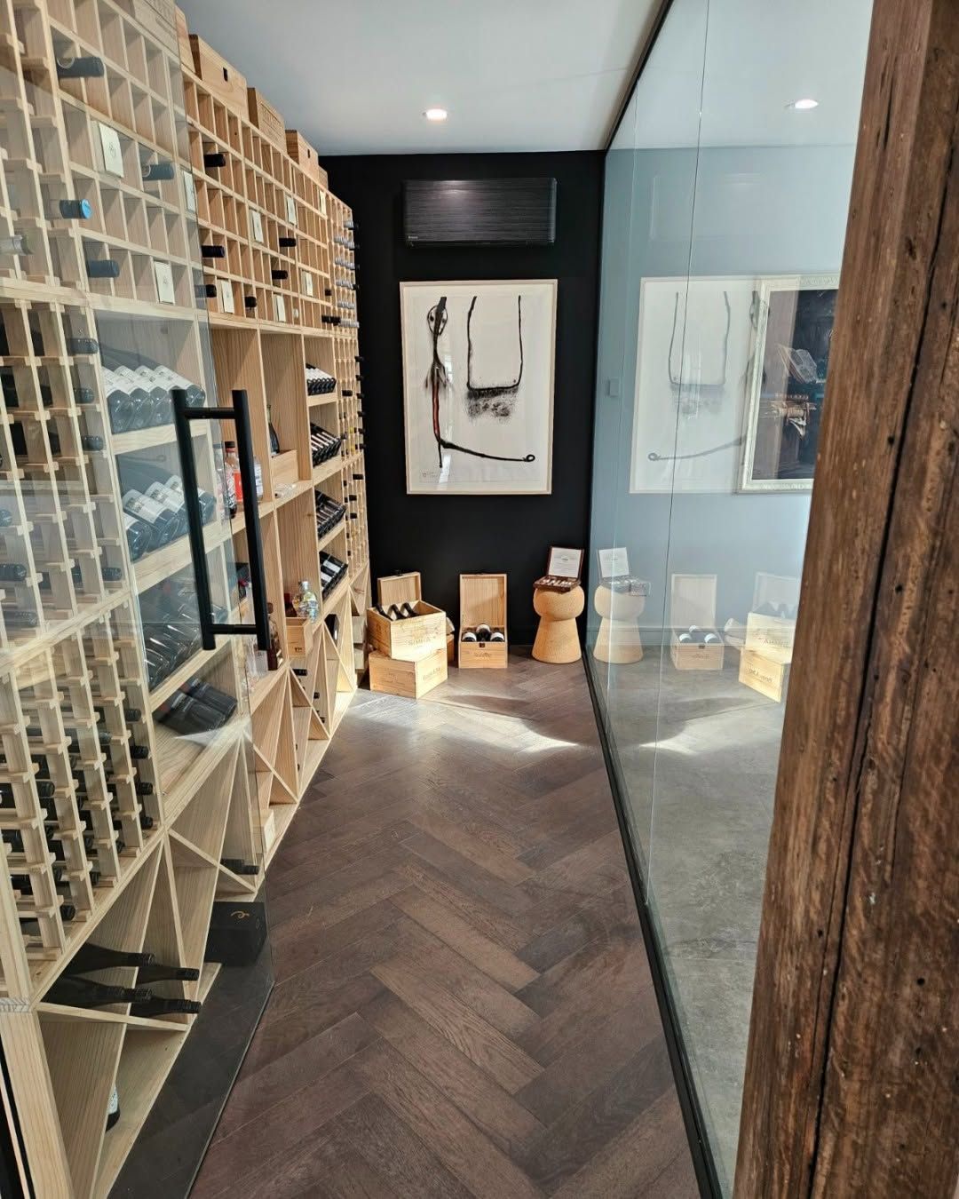 Modern Art Gallery Hallway with Wall-Mounted Artworks — Alpine Refrigeration & Air Conditioning Pty Ltd in Wollongong, NSW