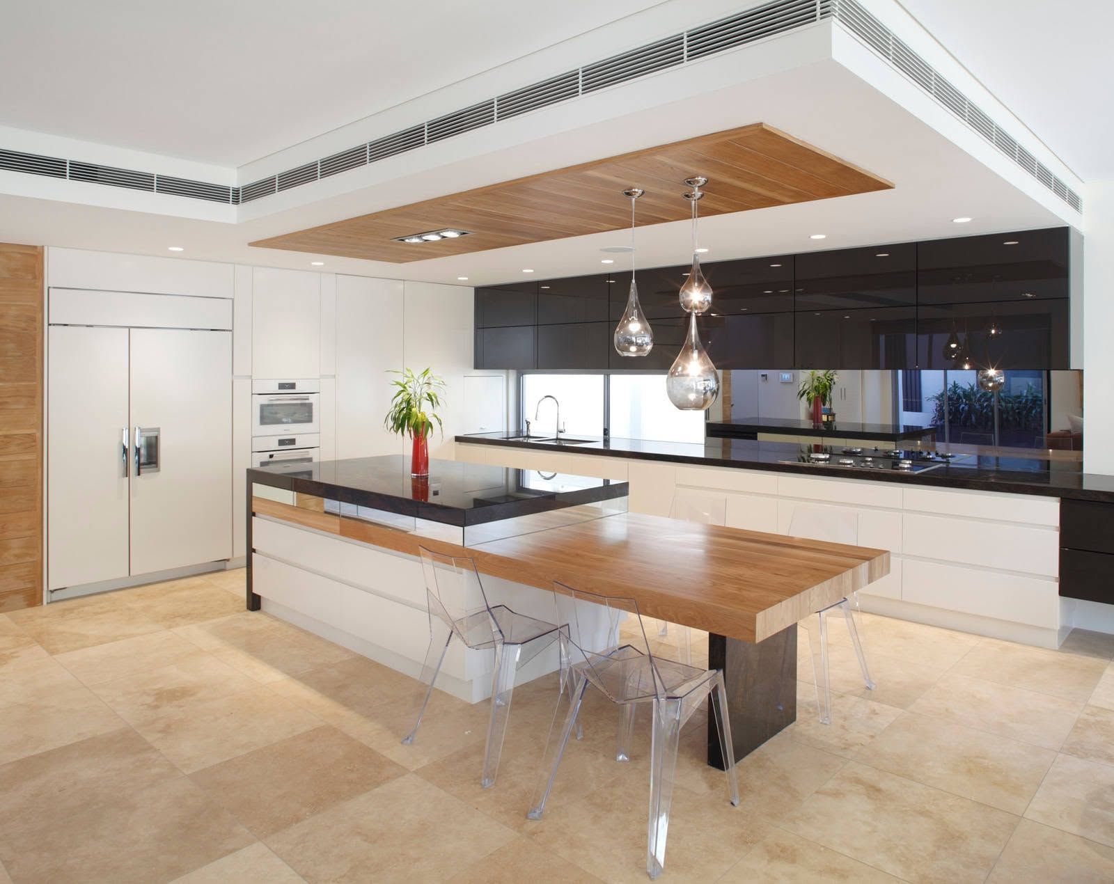 Modern Open-plan Kitchen With Island, Wood Accents, Pendant Lights, and Beige Tile Flooring — Alpine Refrigeration & Air Conditioning Pty Ltd in Shellharbour, NSW