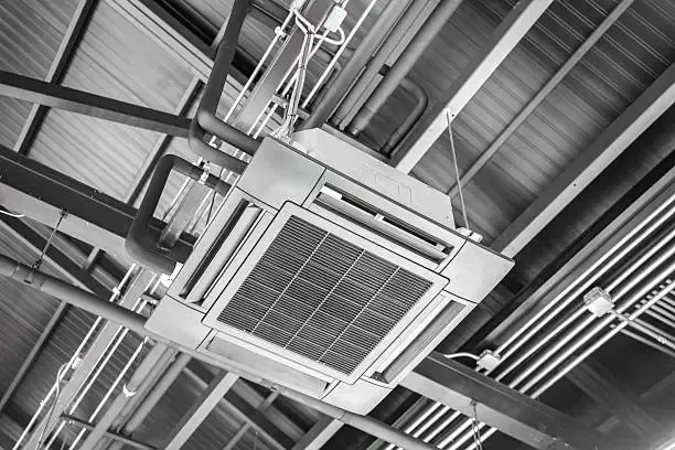Ceiling Mounted Industrial Air Conditioner With Exposed Beams — Alpine Refrigeration & Air Conditioning in Wollongong, NSW Ceiling Mounted Industrial Air Conditioner With Exposed Beams — Alpine Refrigeration & Air Conditioning Pty Ltd in Wollongong, NSW