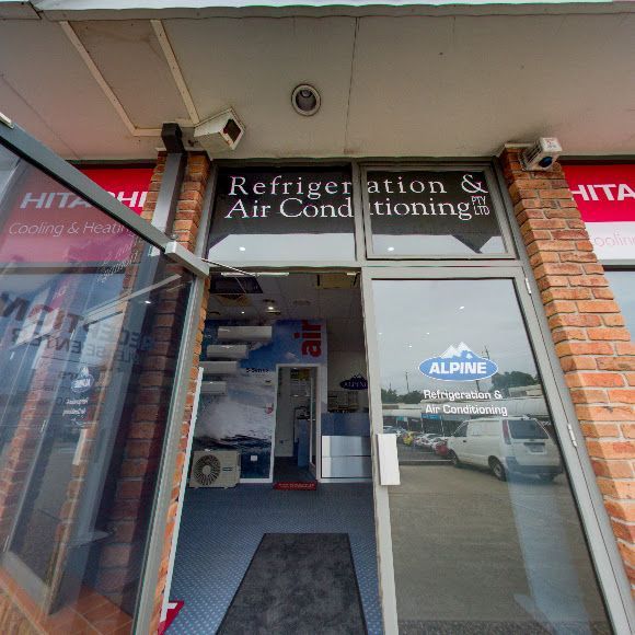 Storefront for Refrigeration & Air Conditioning with Glass Door — Alpine Refrigeration & Air Conditioning Pty Ltd in Wollongong, NSW