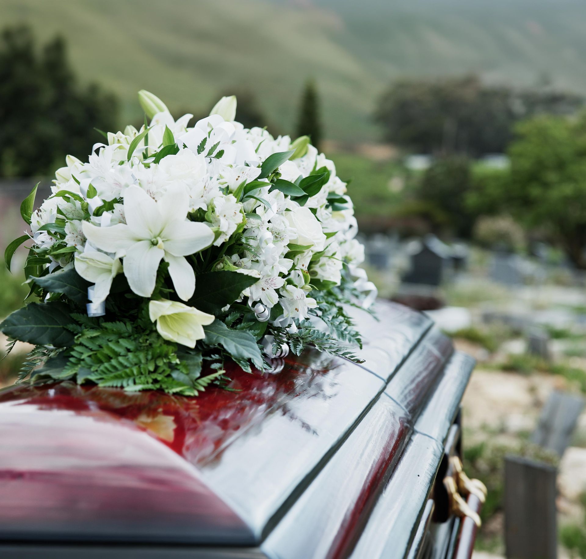 White flowers on a casket
