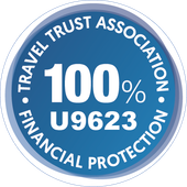 Blue circular Travel Trust Association badge with “100% U9623” and “Financial Protection” text