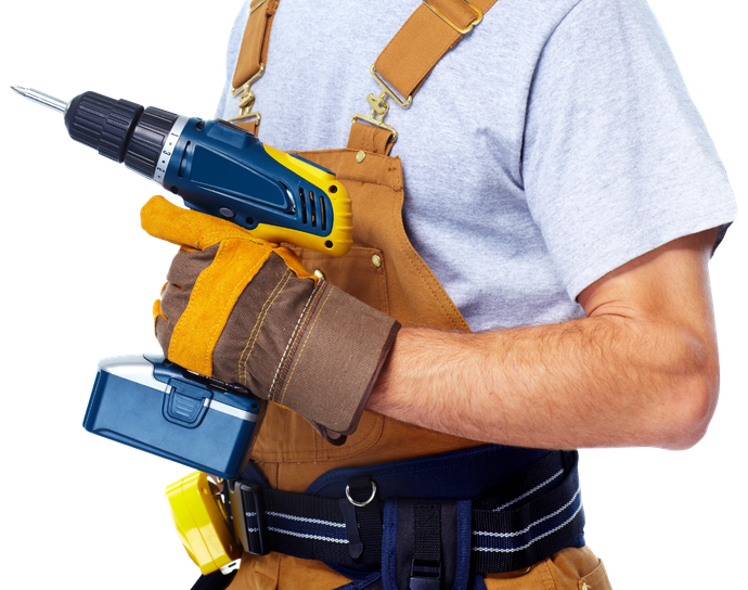 Handyman with a drill. House renovation service.