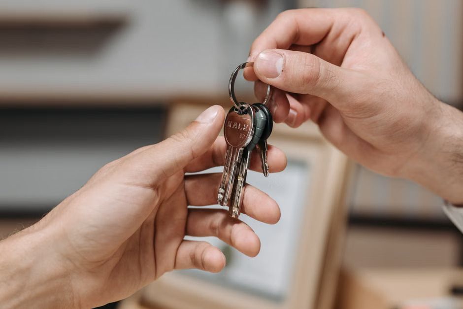 Landlord and tenant reviewing documents during an online arbitration process to resolve a rental dispute quickly and avoid court.
