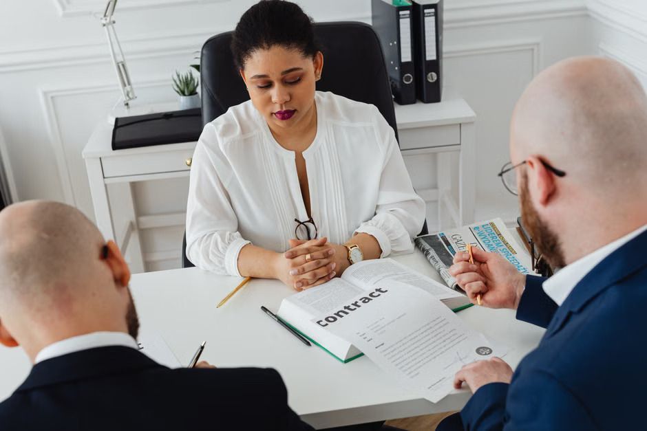Professional using an online arbitration platform to submit documents and resolve a contract dispute without going to court.
