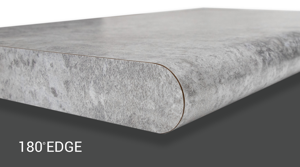 Gray concrete slab with rounded 180° edge on a dark background