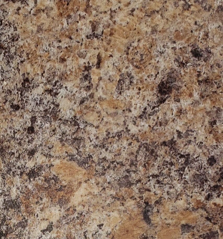 Close-up of speckled beige, brown, and gray granite countertop surface