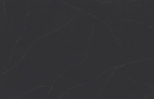 Dark gray stone or marble surface with faint white veins.