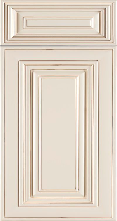 Cream-colored paneled cabinet door with a small drawer above it.