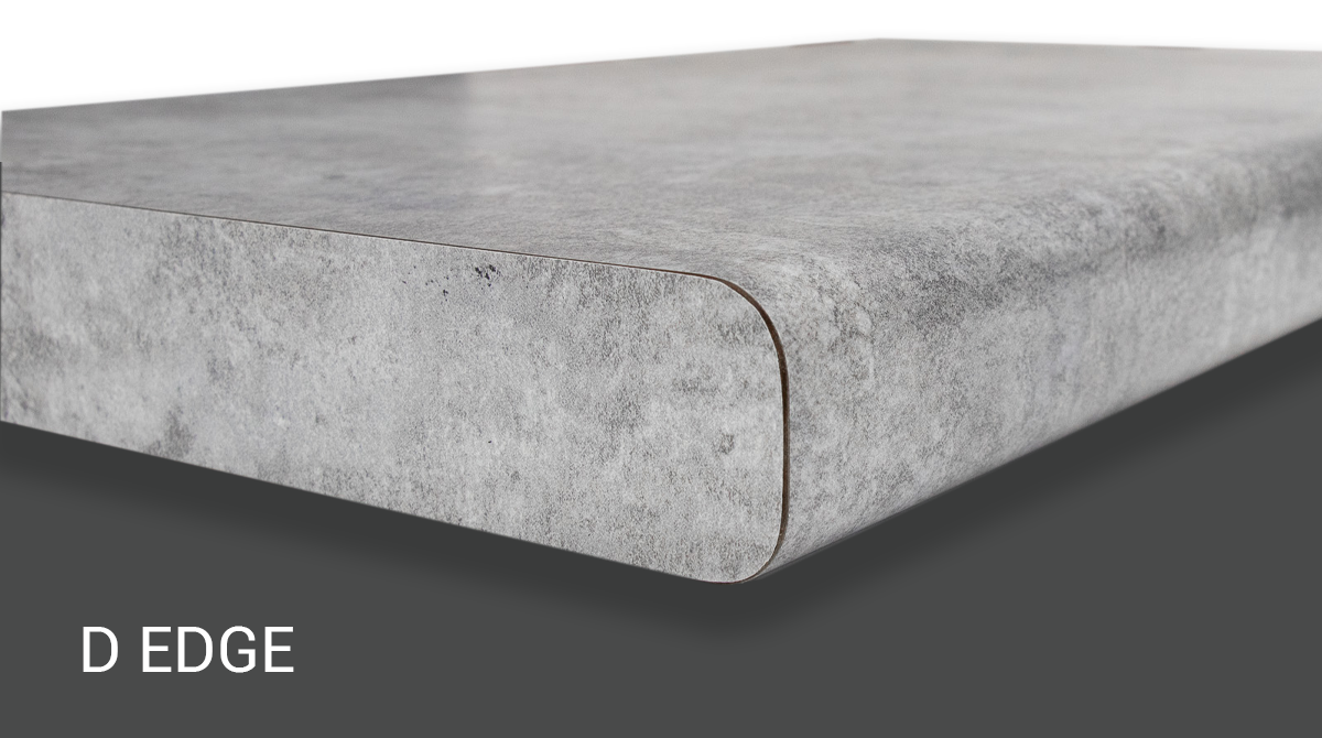 Gray upholstered mattress with rounded D-edge corner on a dark background