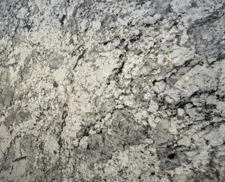 Close-up of rough gray and white stone or concrete texture