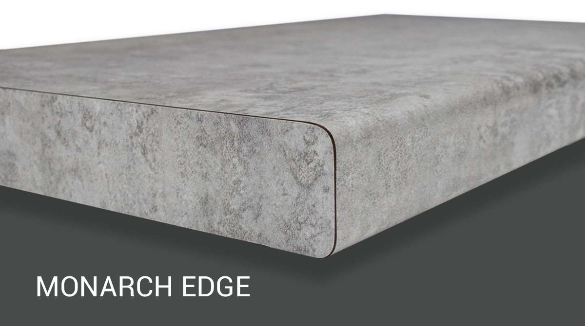 Gray concrete countertop edge with rounded corner on a dark background, labeled “Monarch Edge”