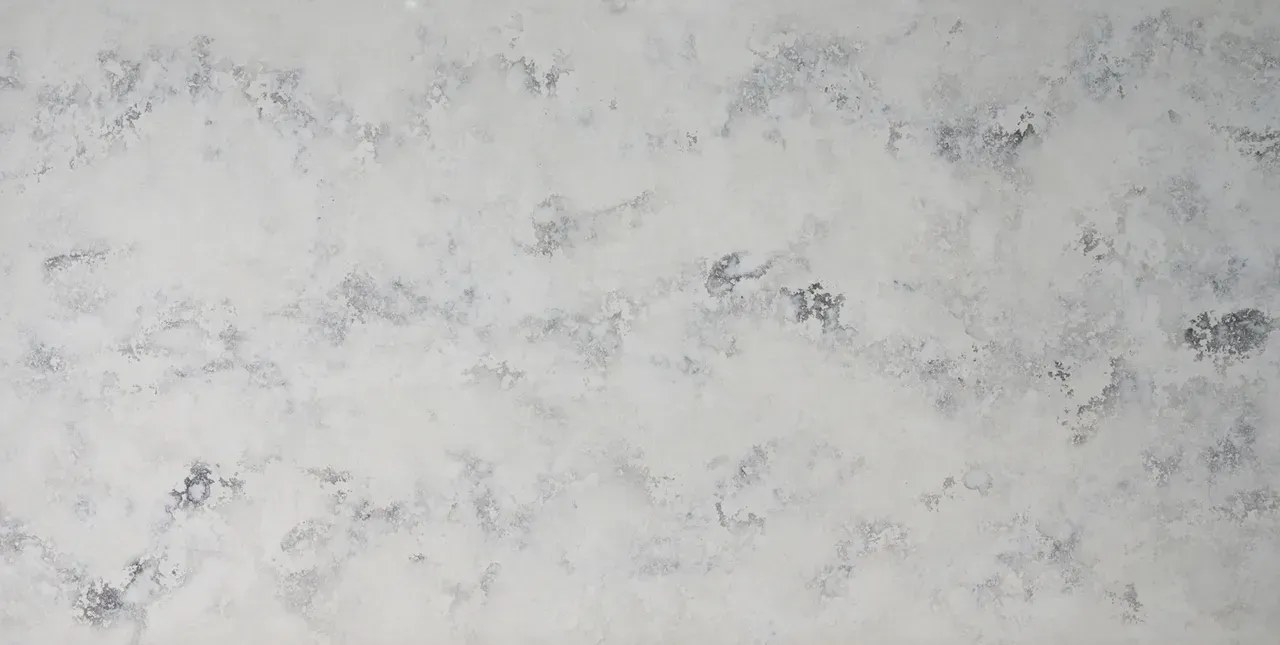 Light gray marbled stone surface with subtle white and dark veining