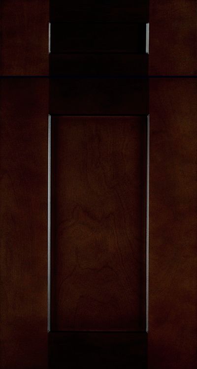 Wooden cabinet doors with vertical silver handles, viewed close up.