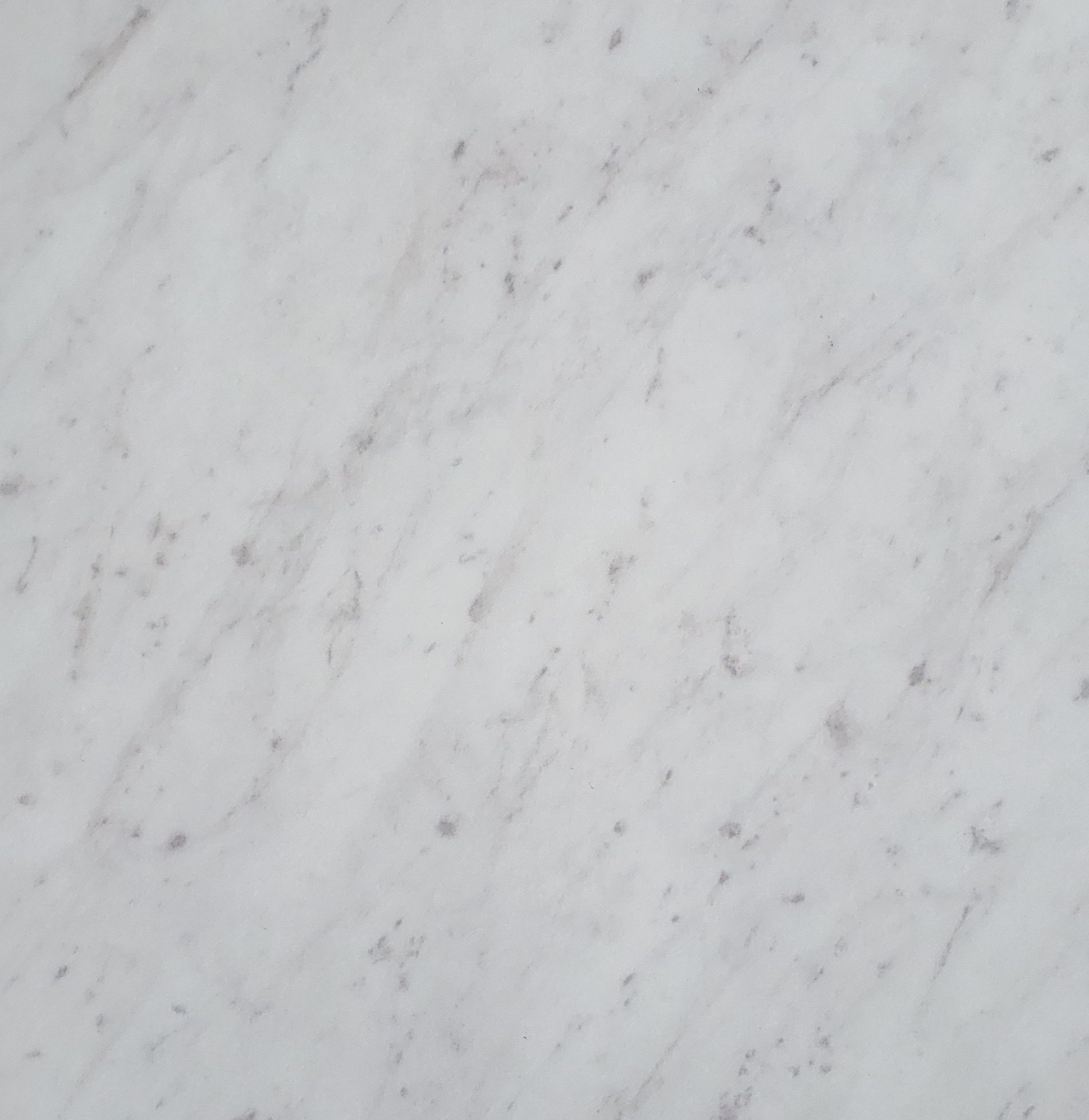 Light gray marble surface with subtle veining and speckled texture
