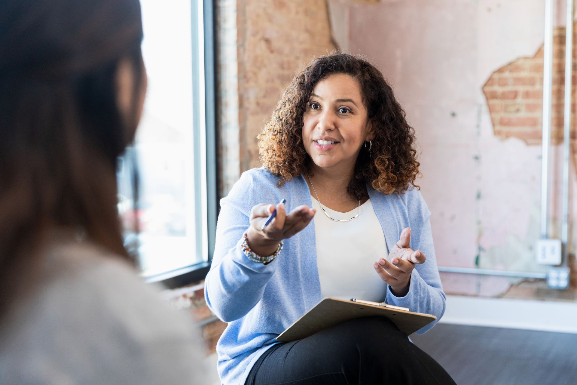 Woman talking with a doctor