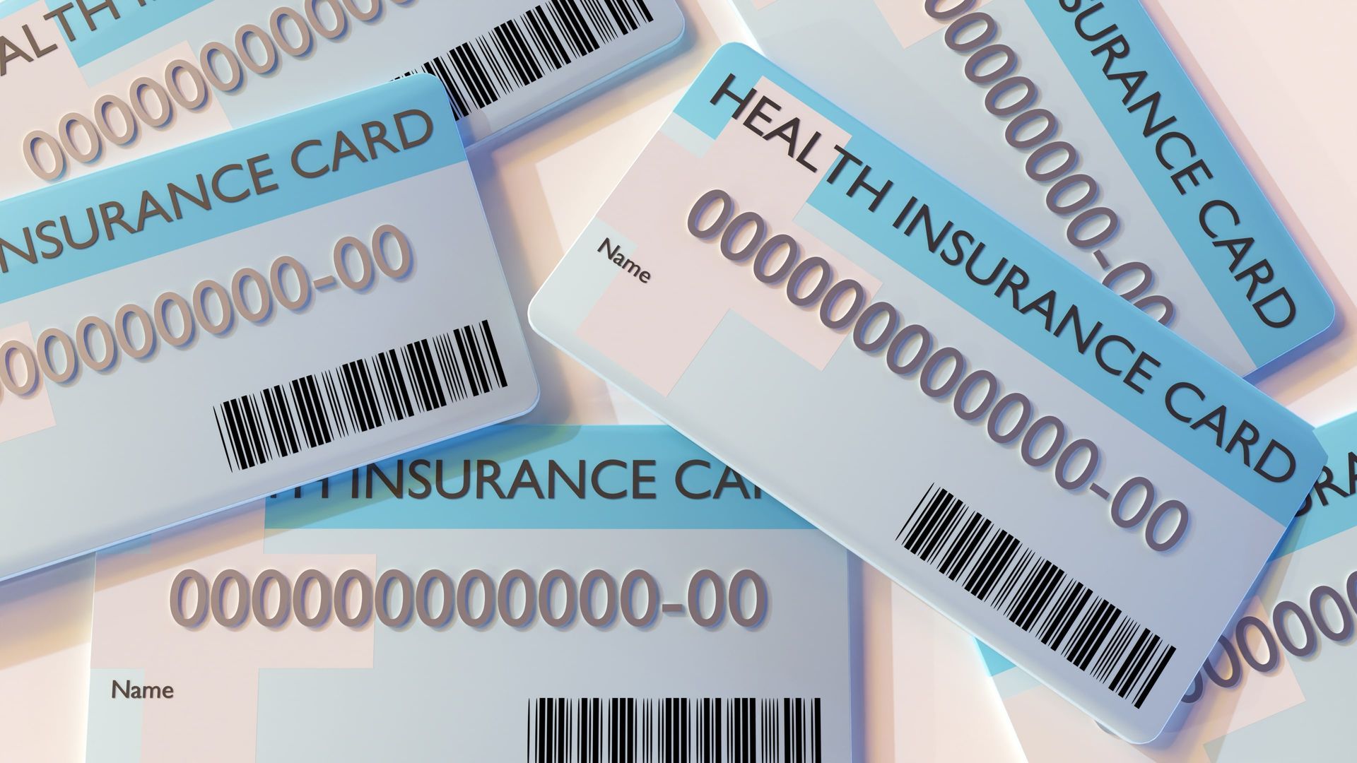 Insurance cards scattered on a table