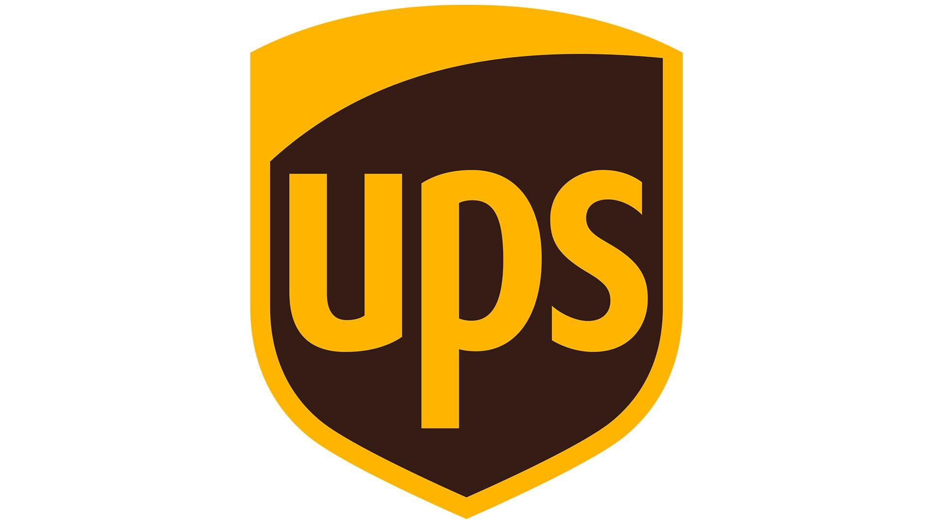 Logo UPS marron et or en forme de bouclier avec bordure jaune et lettres dorées