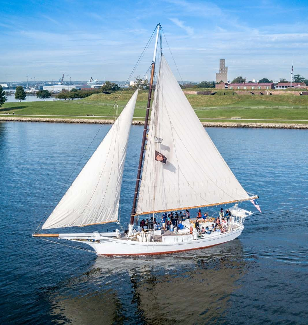 A sailboat with the number 5 01 on the sail