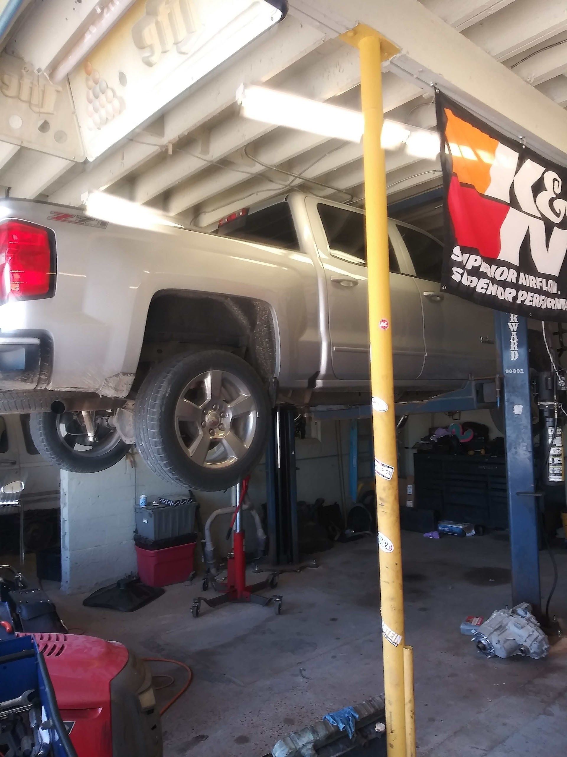 Truck Lifted For Auto Repair Service | TransZilla Automotive