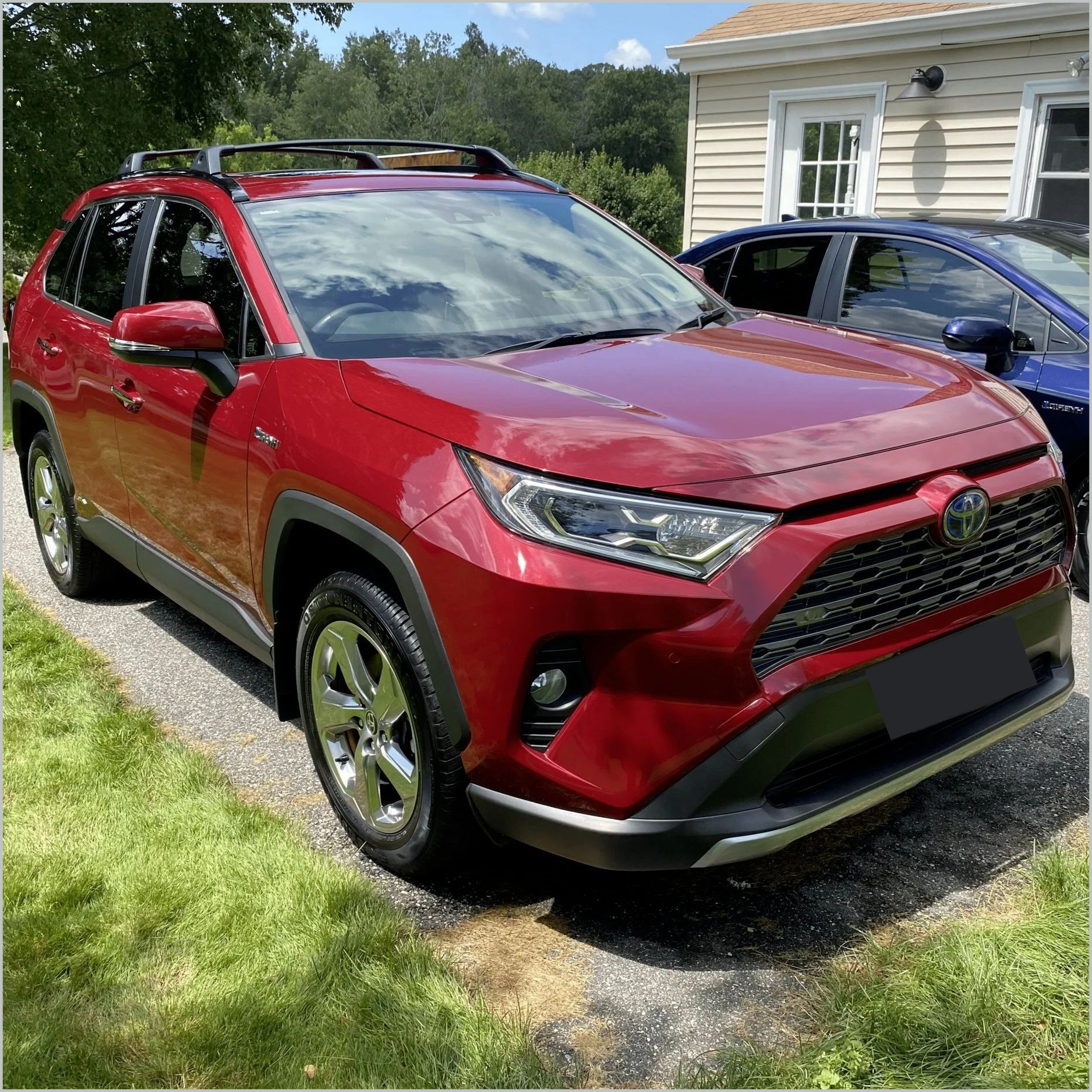 Red Toyota RAV4 SUV Parked on a Gravel Driveway — Detailed By Dan In Mirriwinni, QLD