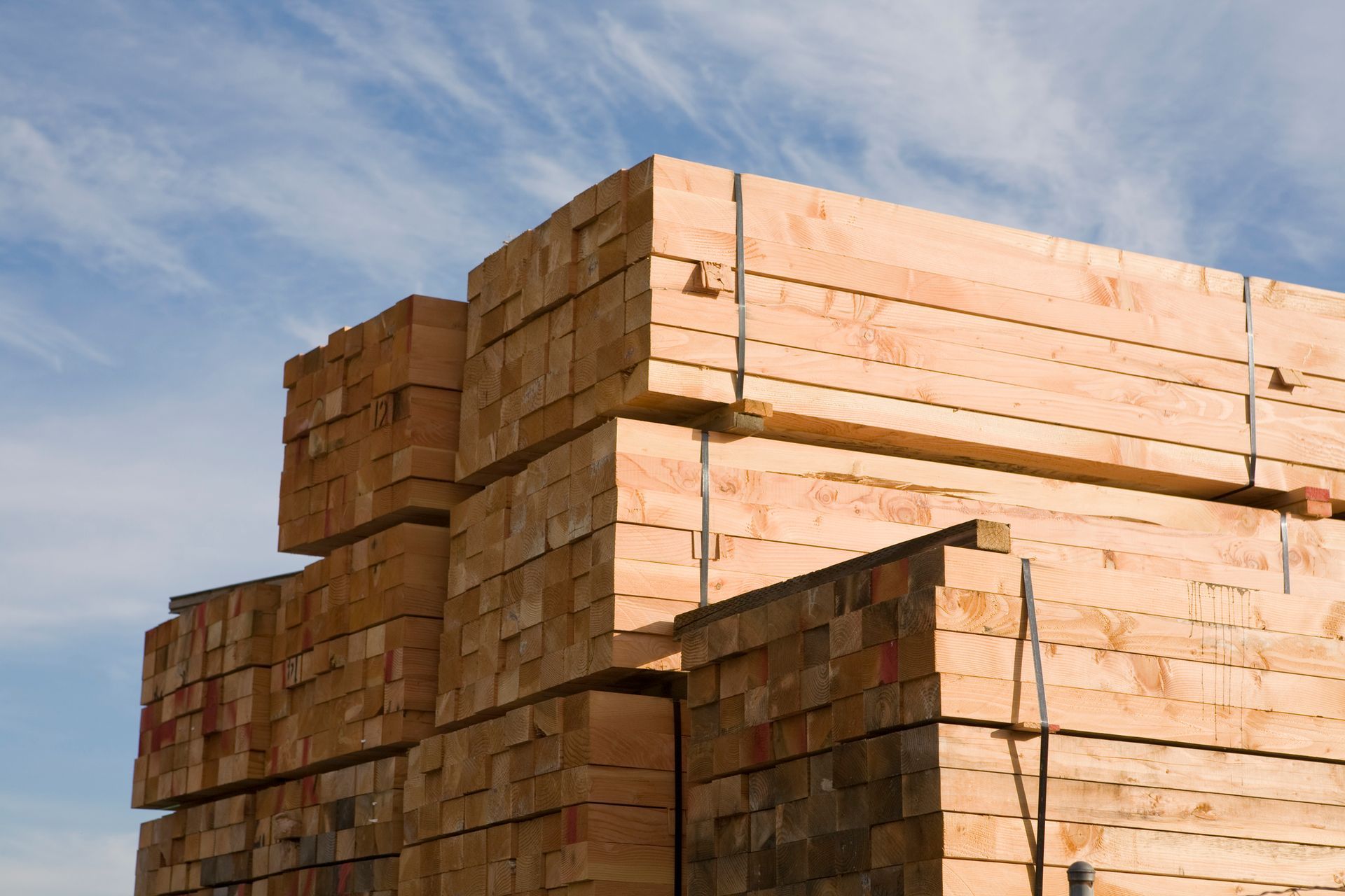Stacks of lumber in a lumberyard.