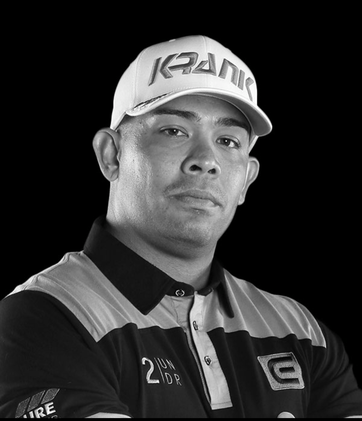 A man wearing a hat with the word rank on it