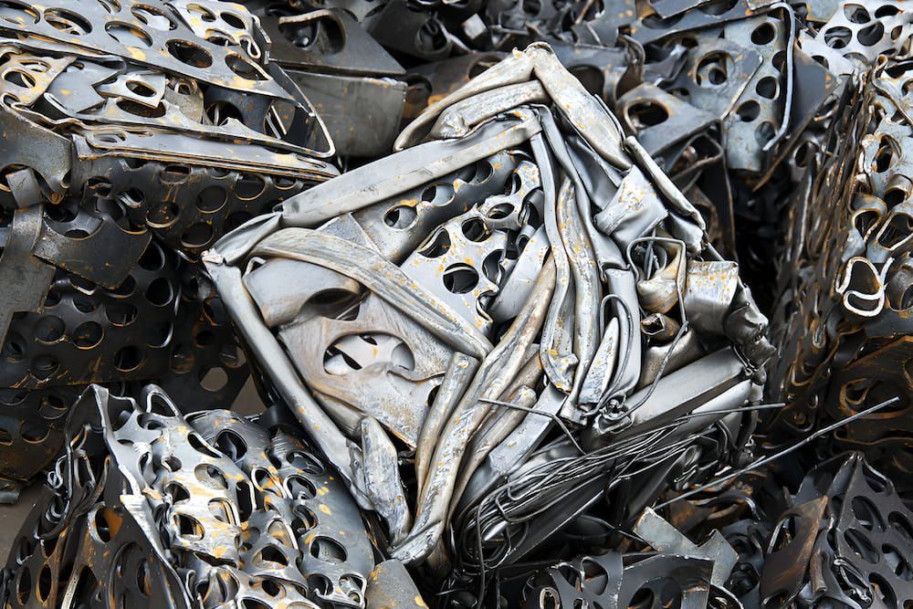A Pile Of Scrap Metal With A Square In The Middle — Antons Recycling In Ciccone, NT