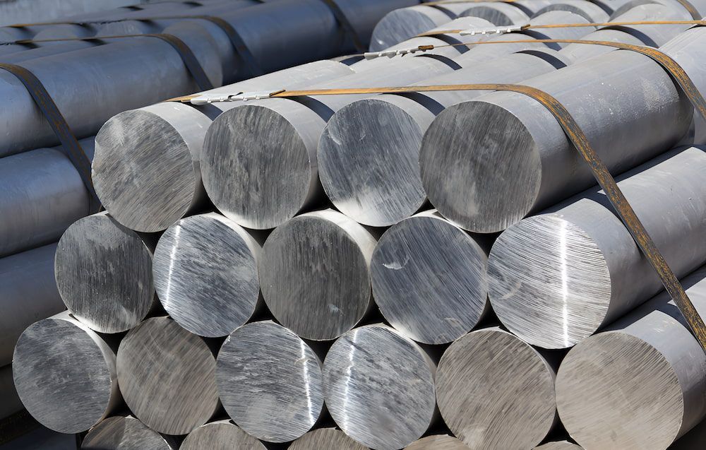 A Bunch Of Aluminum Rods Stacked On Top Of Each Other — Antons Recycling In Ciccone, NT