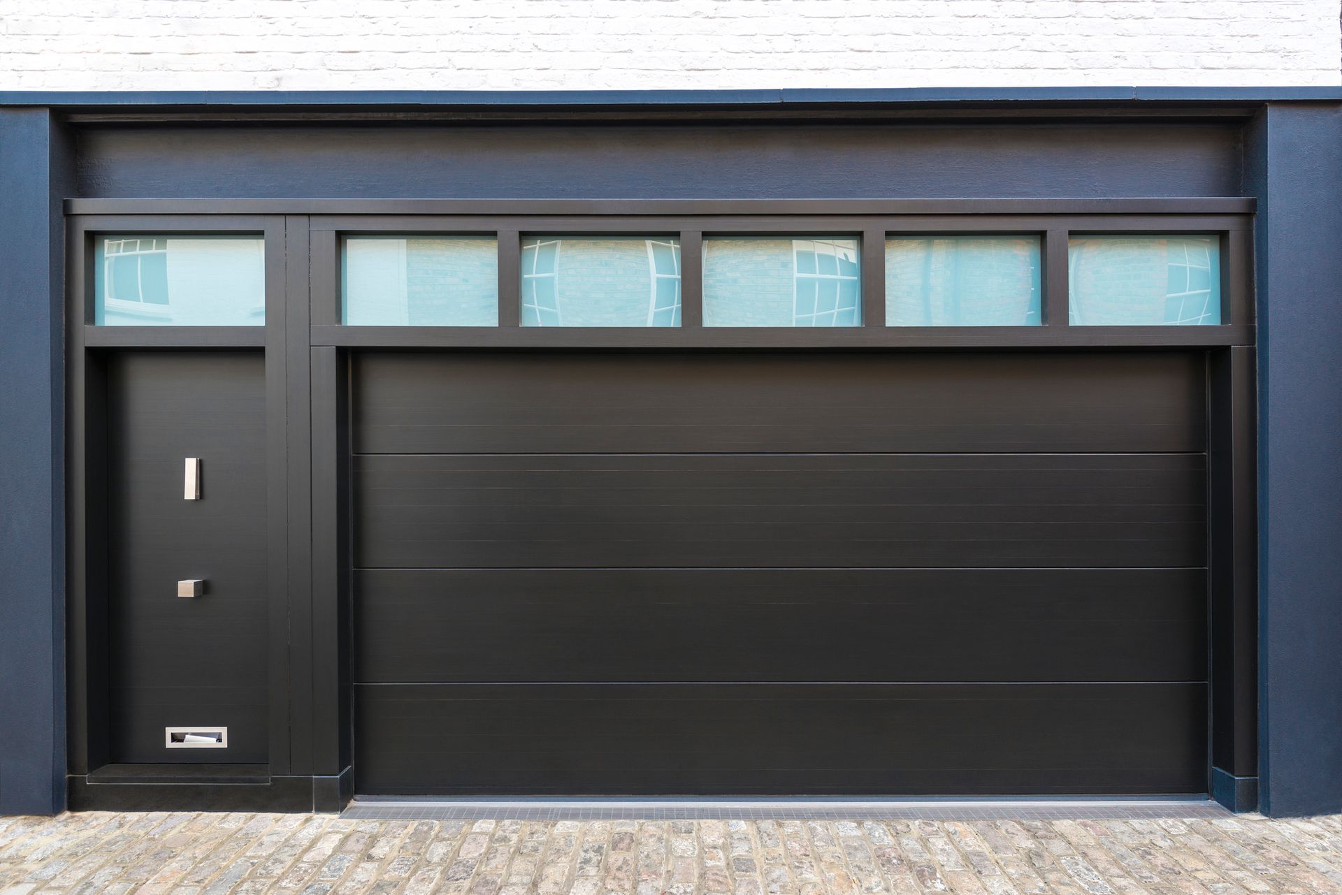 Picture of garage door after being serviced for emergency garage door repair