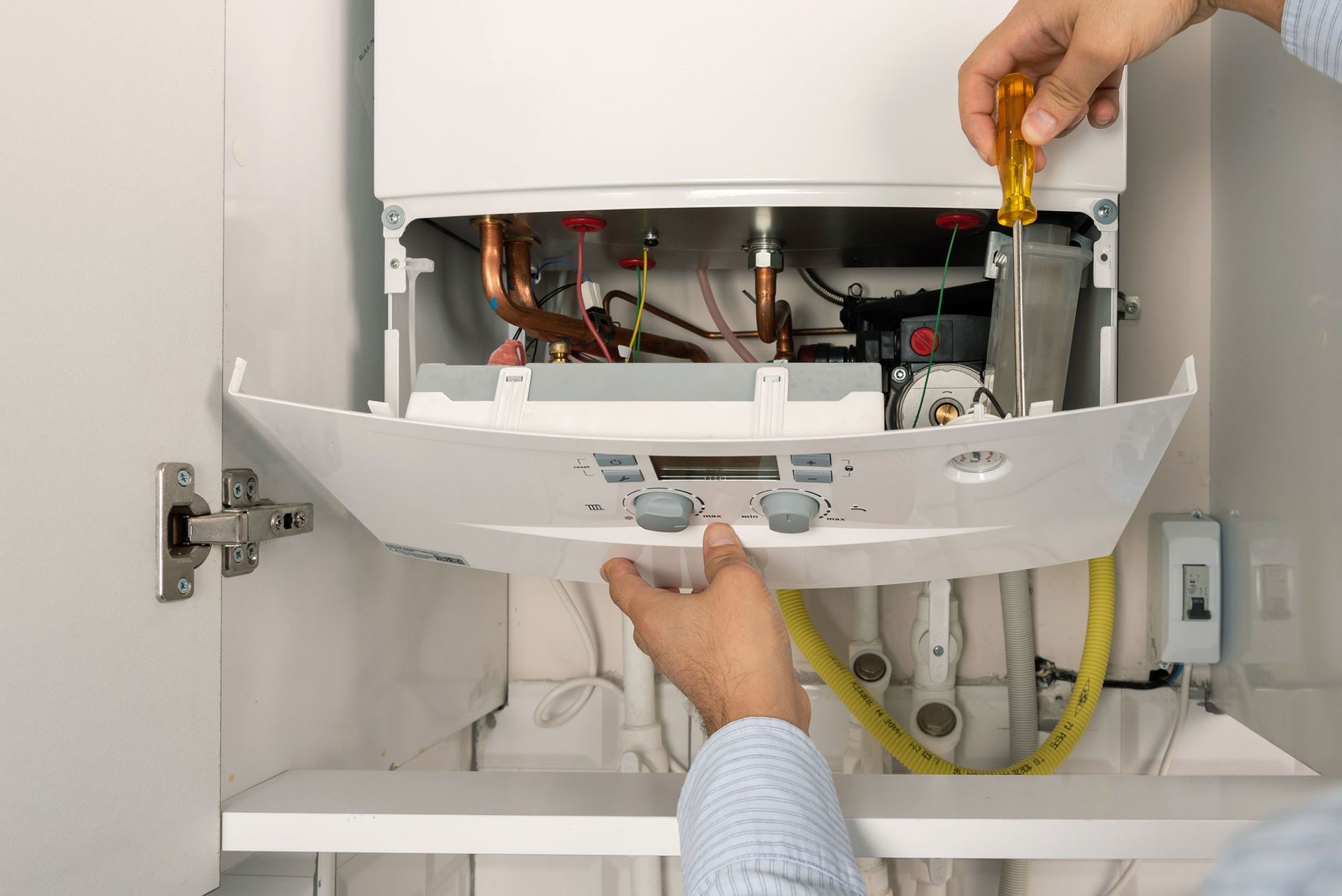 Technician Repairing Water Heater — Foley, AL — Bonner's Plumbing Inc.