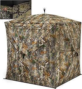 A camouflage tent with a picture of a person in it.