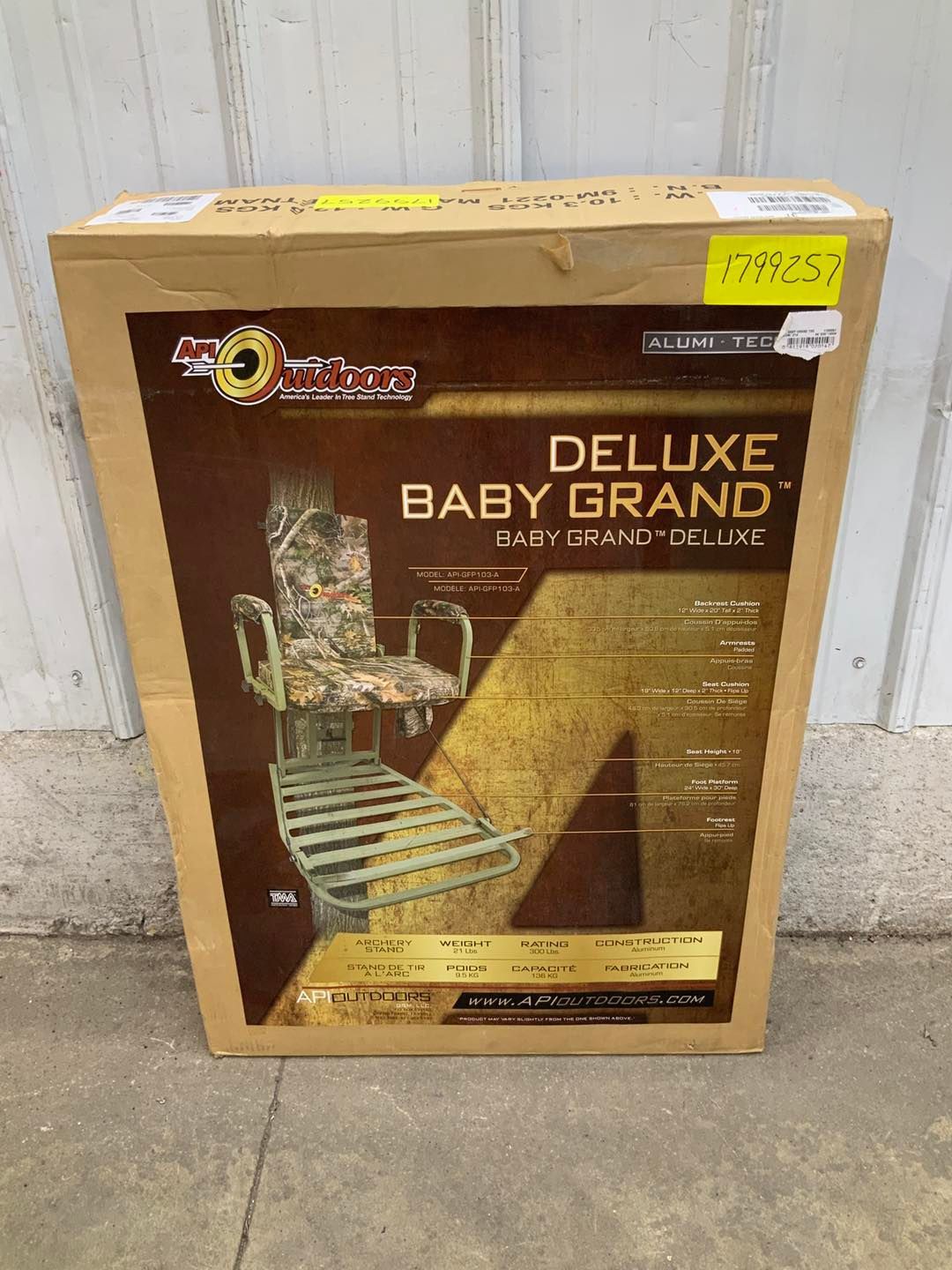 A deluxe baby grand hunting chair is in a box.