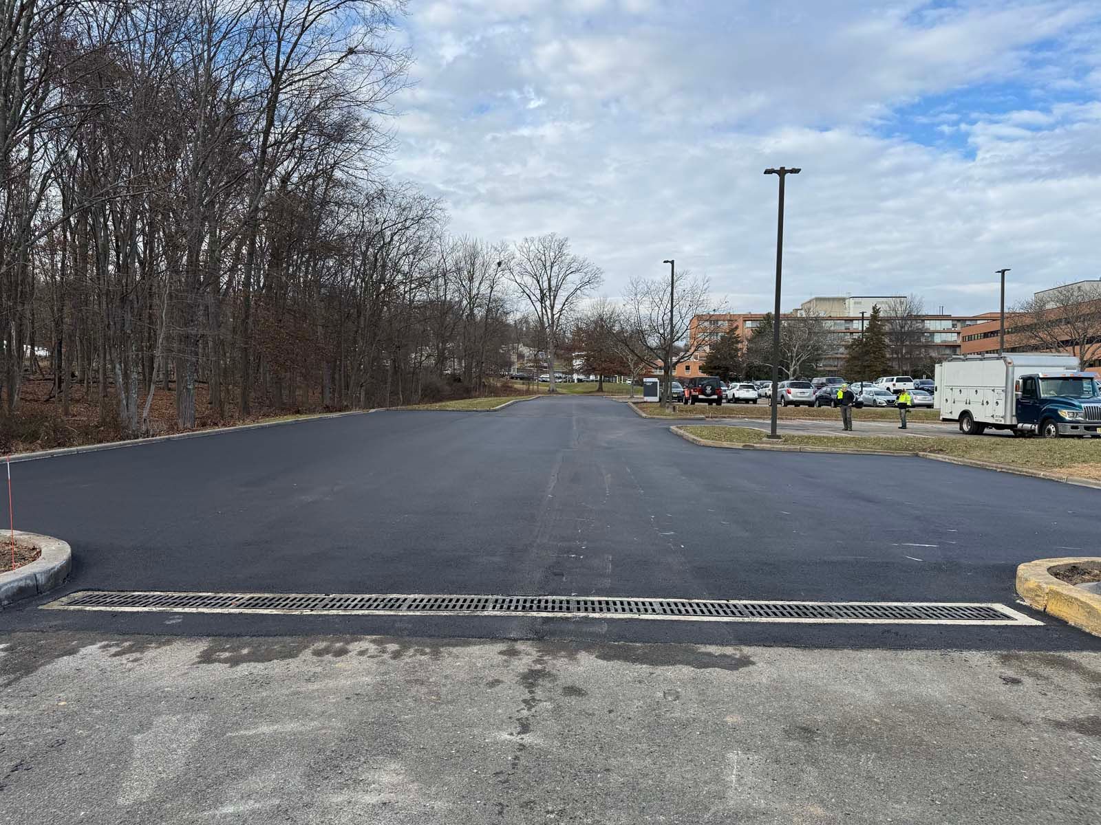 A parking lot with a lot of cars parked in it.