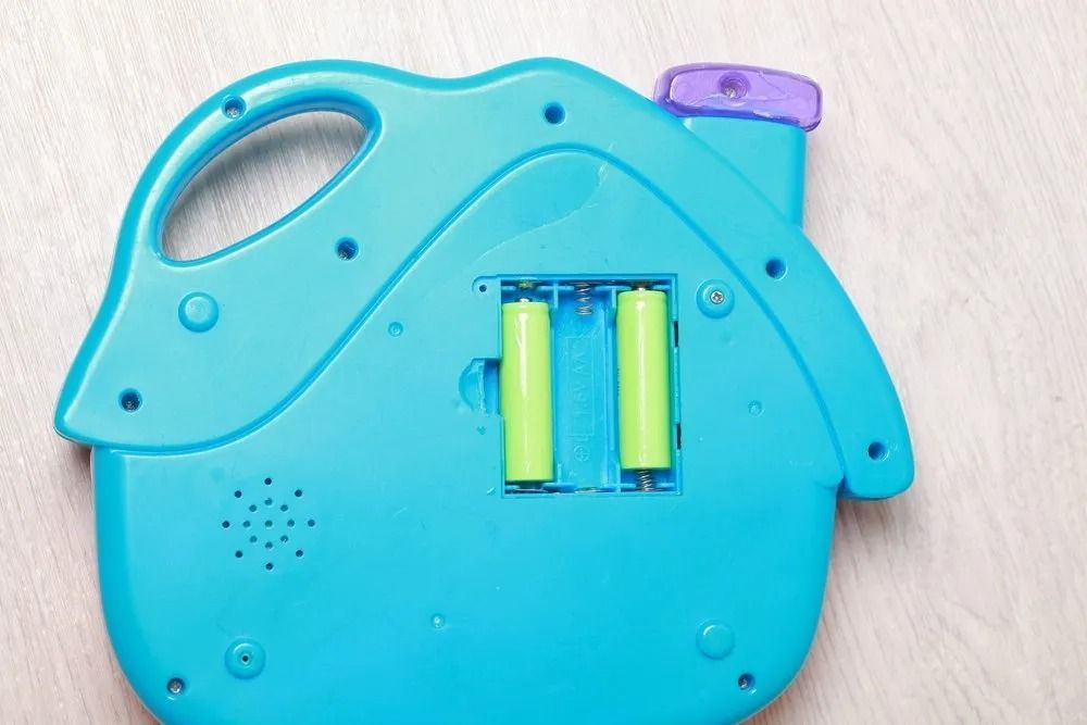 The Back of a Blue Toy With Two Batteries in It — Central Coast Batteries In Long Jetty, NSW