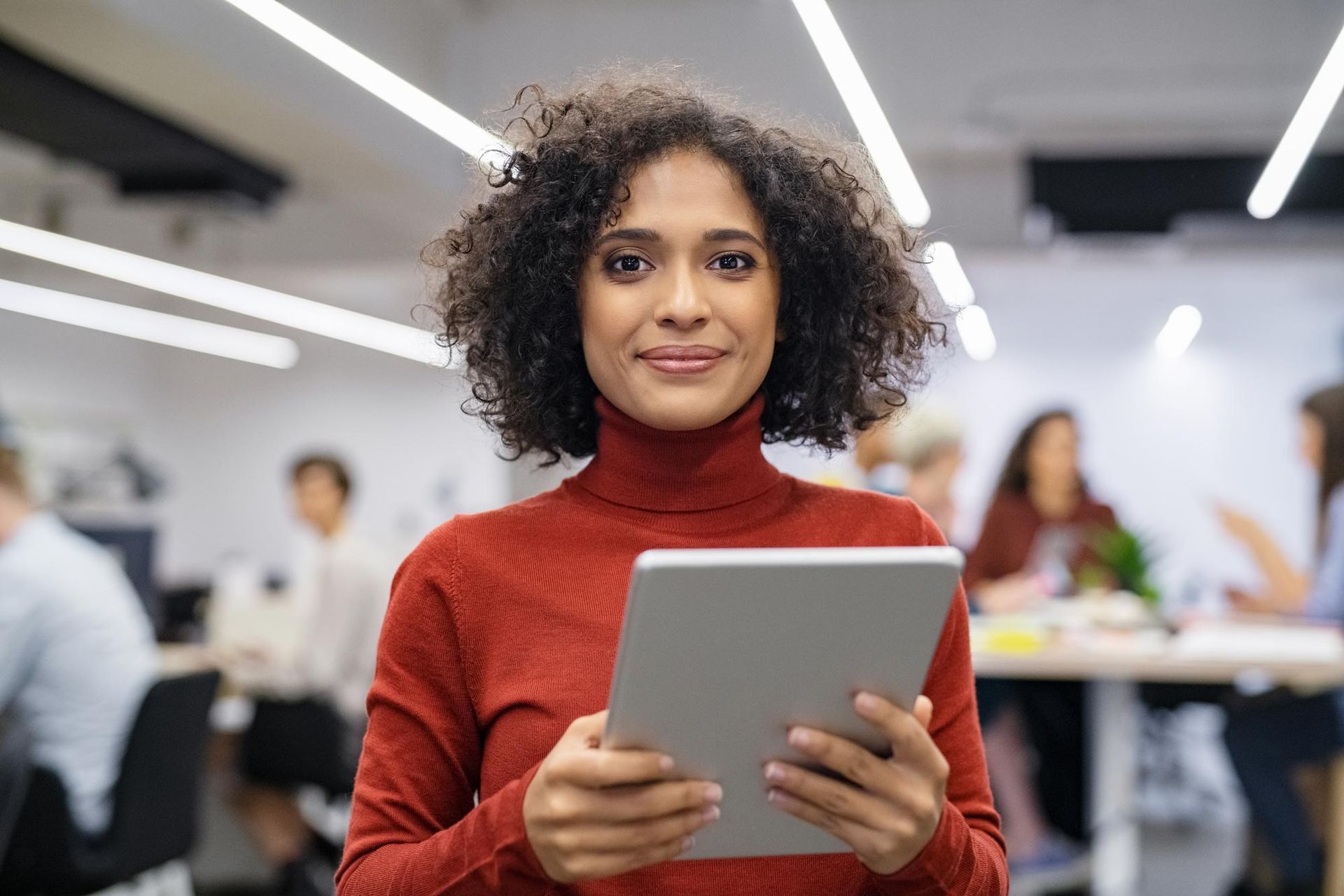A person holding a tablet A person holding a tablet