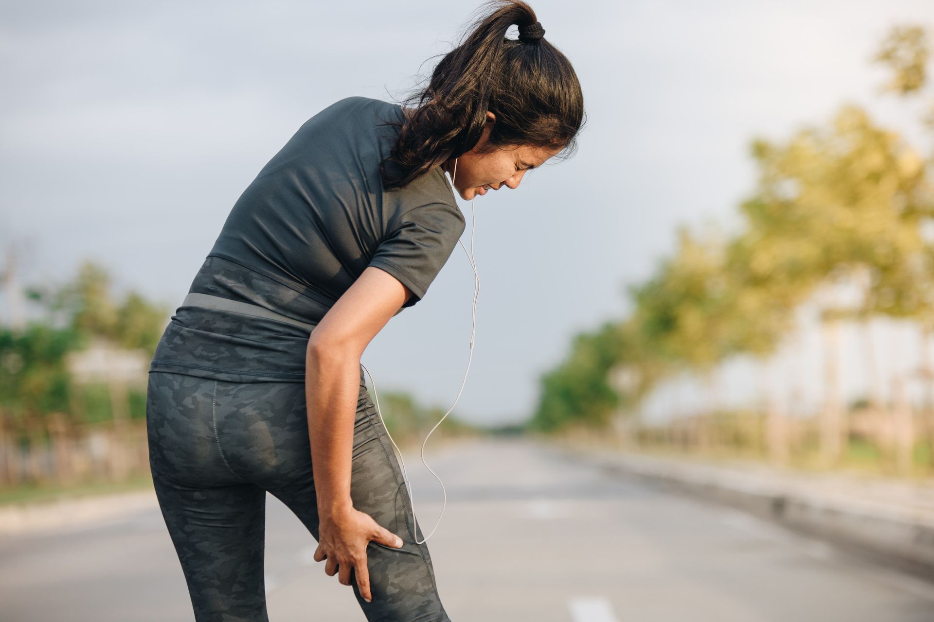 Chiropractor assessing a patient with sciatica pain in Adelaide