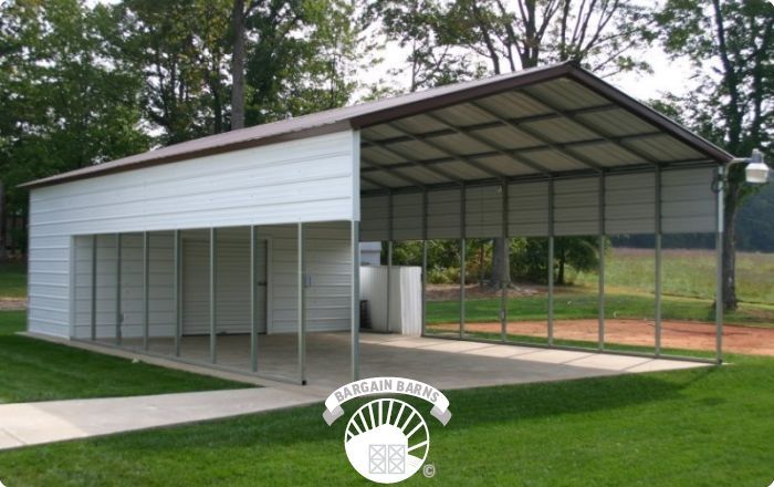 A large white metal building with a brown roof